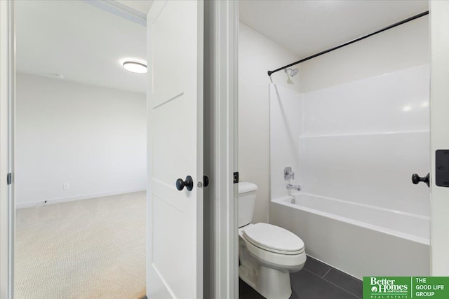 bathroom featuring toilet and bathtub / shower combination