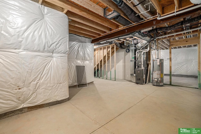 unfinished basement with gas water heater, stairs, and heating unit