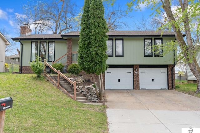 view of front of home with a front lawn, driveway, an attached garage, brick siding, and stairs