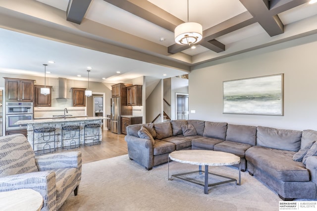 living area with recessed lighting, stairway, light wood finished floors, coffered ceiling, and beam ceiling