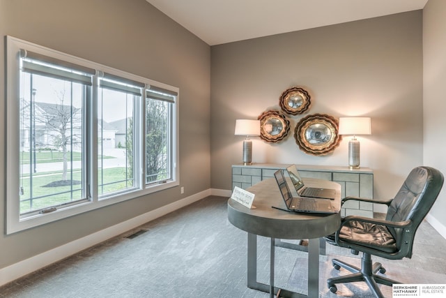 office area featuring carpet floors, visible vents, and baseboards