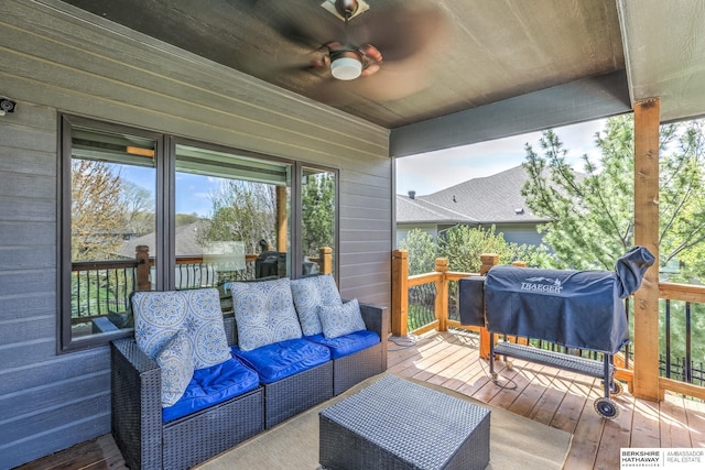 wooden deck with an outdoor living space, a ceiling fan, and a grill