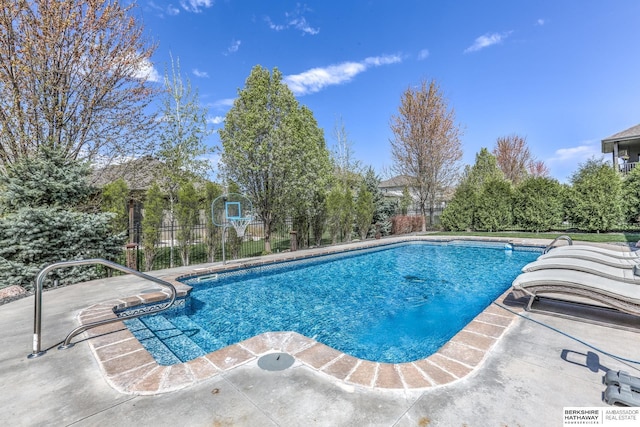 view of swimming pool with fence, a patio area, and a fenced in pool