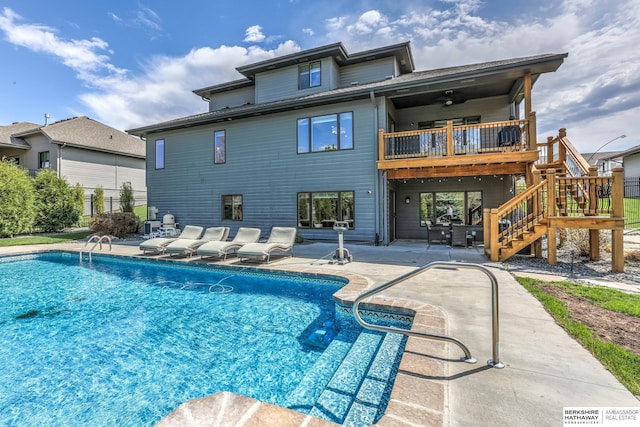 view of swimming pool with fence, stairs, a patio, and a fenced in pool