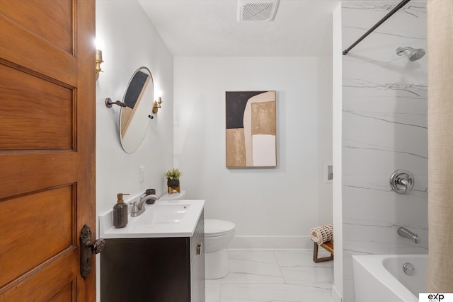 full bath featuring marble look tiles, vanity, toilet, tub / shower combination, and baseboards