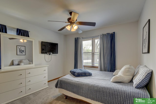 bedroom featuring ceiling fan, carpet floors, and baseboards