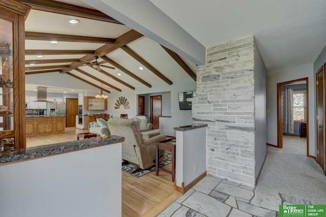 living room with lofted ceiling with beams, baseboards, recessed lighting, and ceiling fan