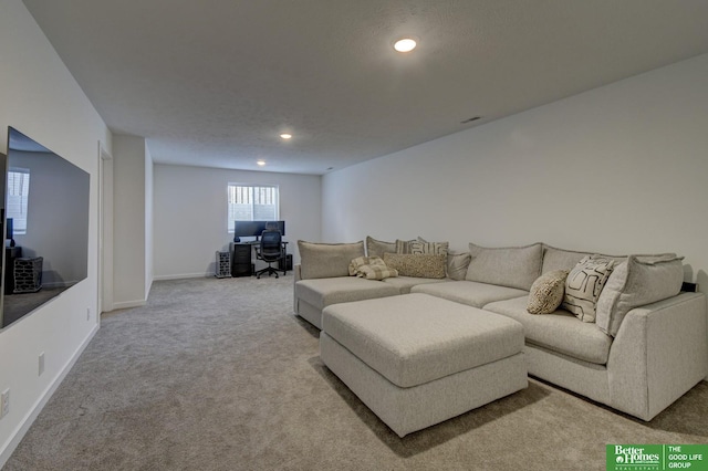 living area featuring baseboards, carpet flooring, and recessed lighting