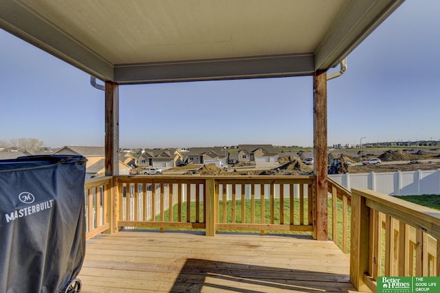wooden deck with a residential view
