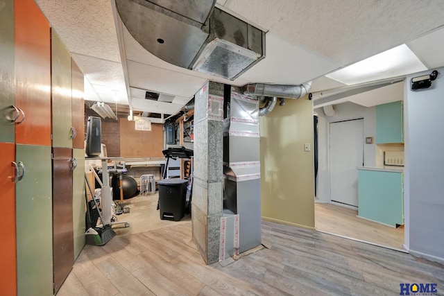 basement featuring wood finished floors