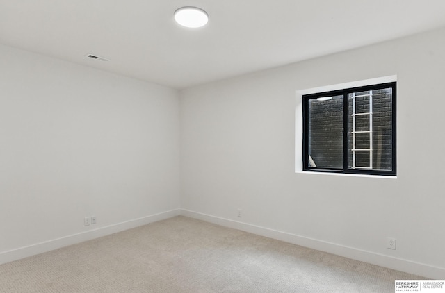 16951 Benjamin St, Bennington, NE 68007 - spare room featuring carpet floors and baseboards