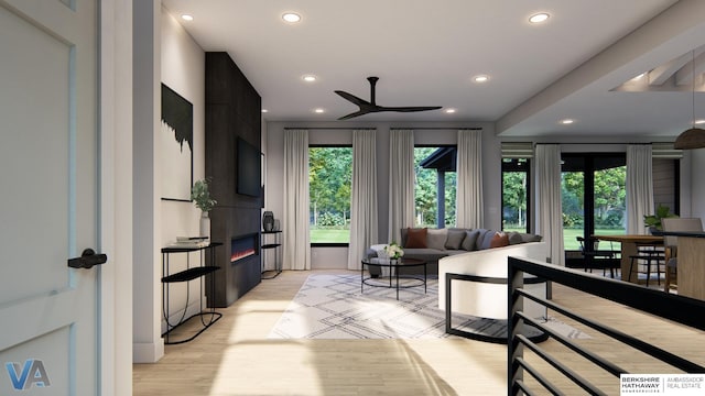 16951 Benjamin St, Bennington, NE 68007 - living area featuring recessed lighting, plenty of natural light, a ceiling fan, light wood-style floors, and a large fireplace