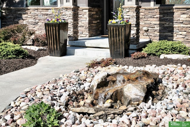 exterior details with stone siding