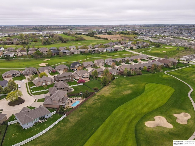 birds eye view of property with a residential view