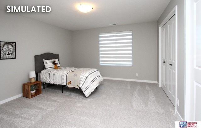bedroom with visible vents, baseboards, carpet floors, and a closet