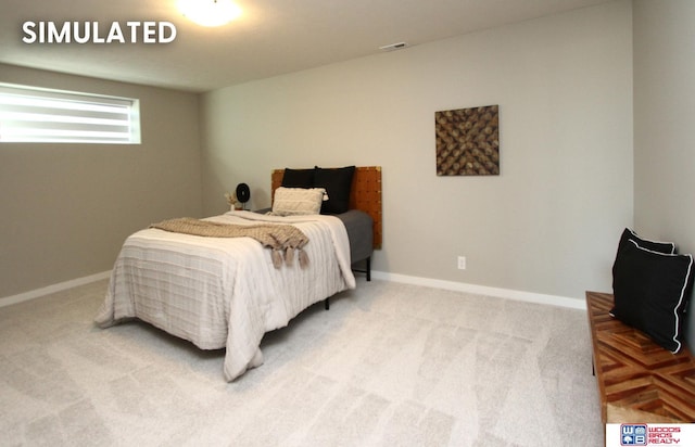 bedroom with carpet floors, visible vents, and baseboards