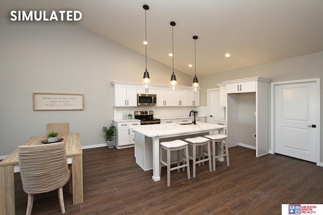 kitchen with stainless steel appliances, a sink, white cabinetry, decorative backsplash, and dark wood-type flooring