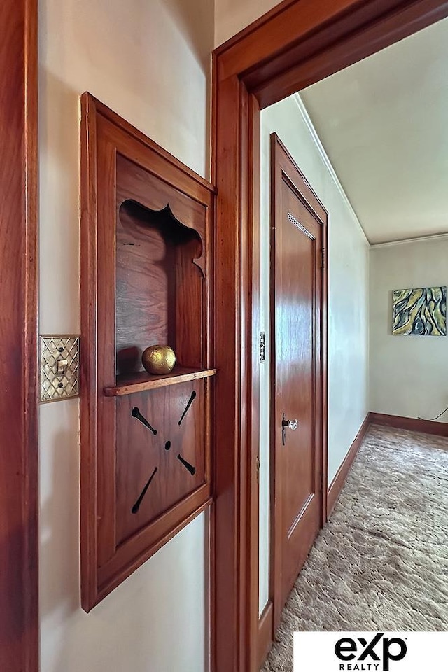 5238 S 20th St, Omaha, NE 68107 - hallway with carpet, crown molding, and baseboards