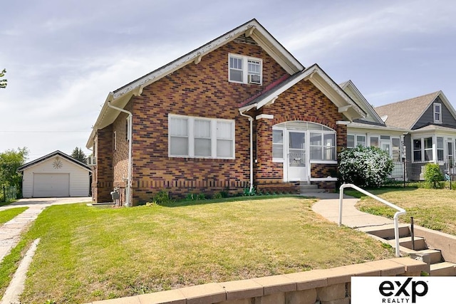 5238 S 20th St, Omaha, NE 68107 - view of front of house featuring an outbuilding, brick siding, a garage, and a front yard