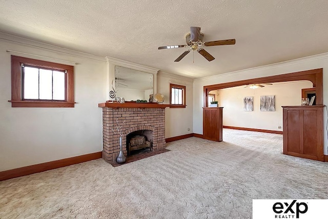 5238 S 20th St, Omaha, NE 68107 - unfurnished living room featuring a ceiling fan, carpet, crown molding, healthy amount of natural light, and baseboards