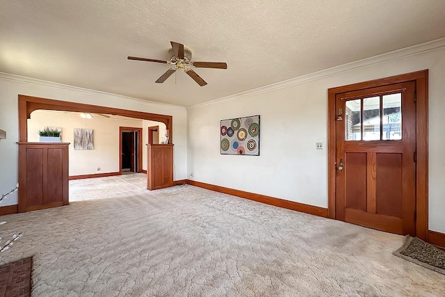 5238 S 20th St, Omaha, NE 68107 - empty room with light colored carpet, baseboards, ceiling fan, and crown molding