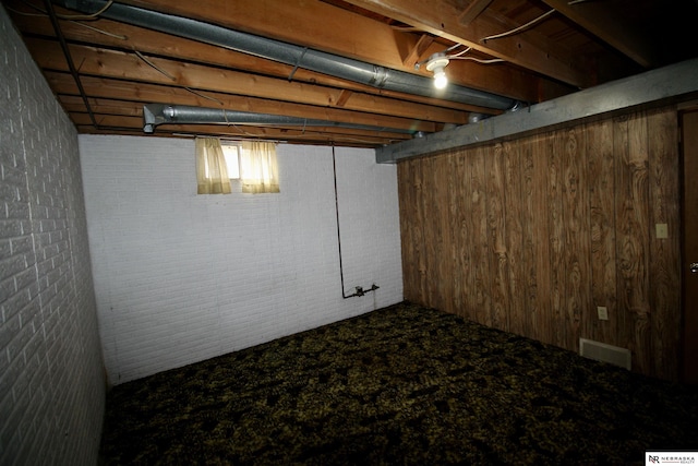 103 Francis St, Daykin, NE 68338 - finished basement with carpet and brick wall