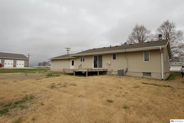 103 Francis St, Daykin, NE 68338 - back of house featuring a detached garage