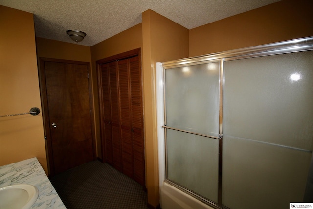 103 Francis St, Daykin, NE 68338 - bathroom featuring a textured ceiling and a sink