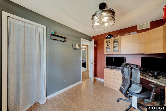 3317 N 9th St, Lincoln, NE 68521 - office space featuring baseboards, light wood finished floors, and visible vents