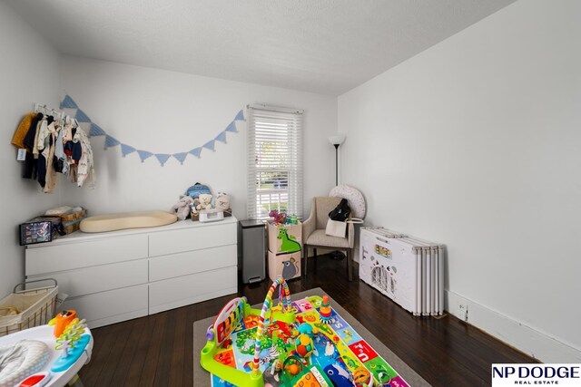 recreation room featuring hardwood / wood-style flooring