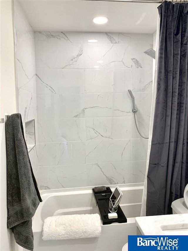 full bathroom featuring shower / tub combo, vanity, recessed lighting, and toilet