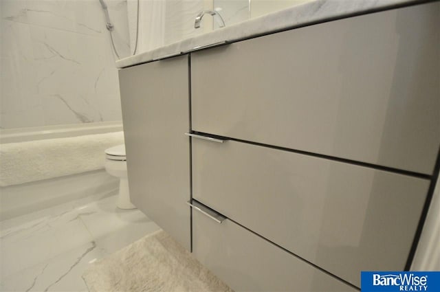 full bath featuring walk in shower, marble finish floor, and toilet