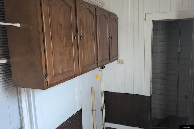 interior details featuring wooden walls