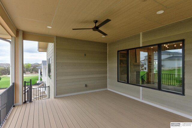 wooden terrace with ceiling fan