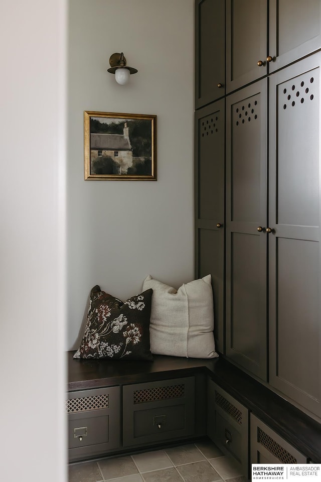 mudroom with light tile patterned floors