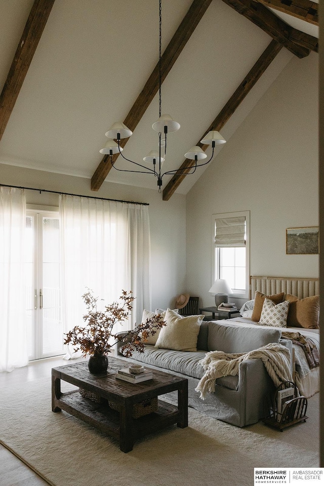 carpeted living room with high vaulted ceiling, an inviting chandelier, and beamed ceiling