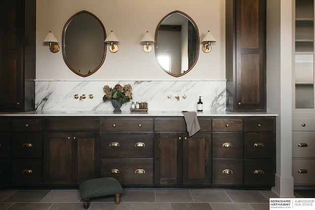 bathroom featuring tasteful backsplash