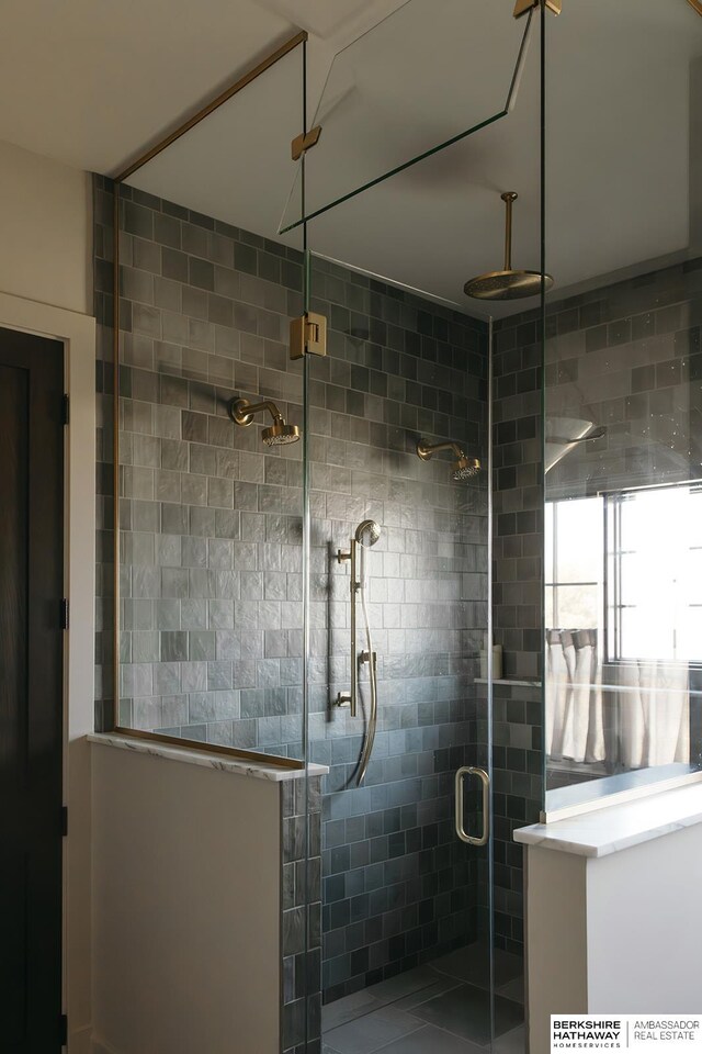 bathroom featuring a stall shower