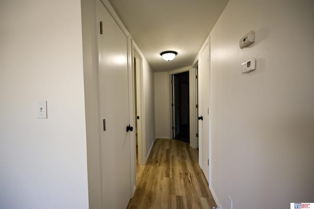 4915 Walker Ave, Lincoln, NE 68504 - hall with light wood-style floors and baseboards