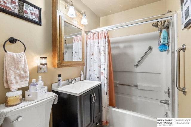 full bathroom featuring toilet, vanity, and shower / bathtub combination with curtain