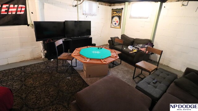 playroom with concrete block wall