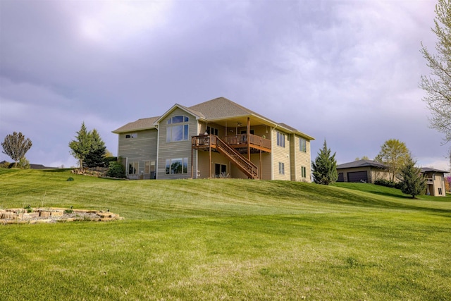 4510 W High Ridge Pl, Lincoln, NE 68522 - back of property featuring stairway, a wooden deck, and a lawn