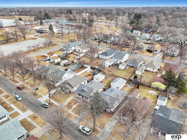 birds eye view of property with a residential view