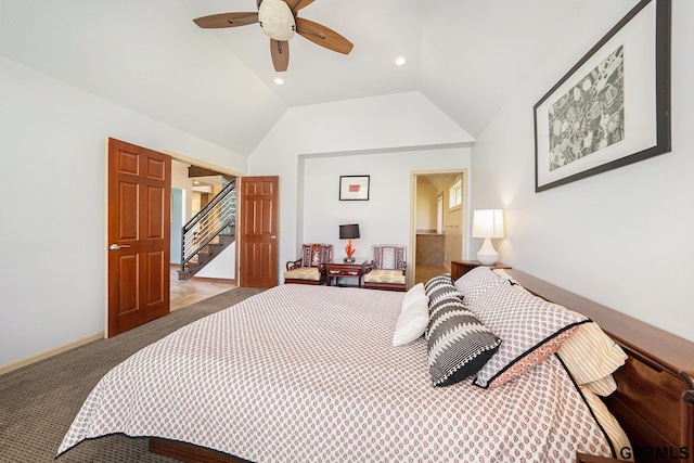 bedroom featuring carpet floors, lofted ceiling, and a ceiling fan