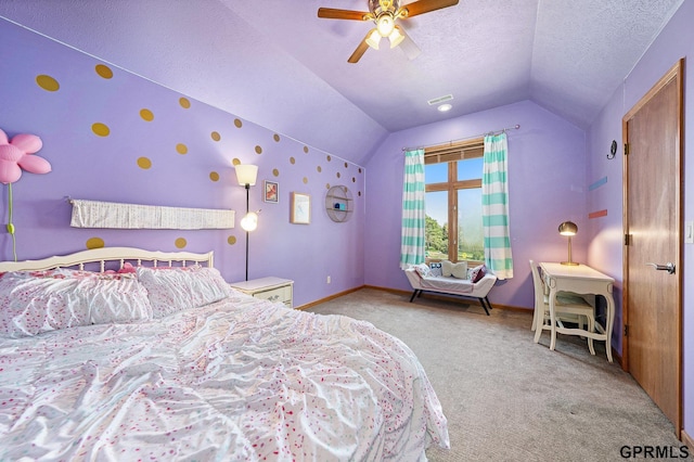 bedroom with a textured ceiling, baseboards, carpet, lofted ceiling, and ceiling fan