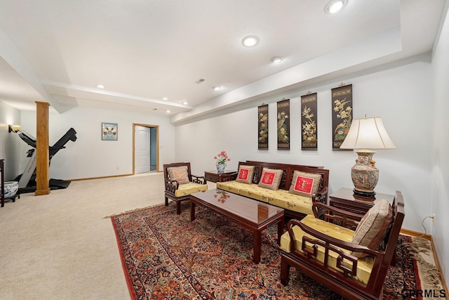 carpeted living area featuring recessed lighting and baseboards