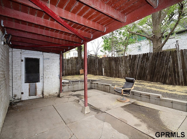 view of patio with a pergola and a fenced backyard