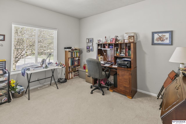 home office with carpet floors and baseboards