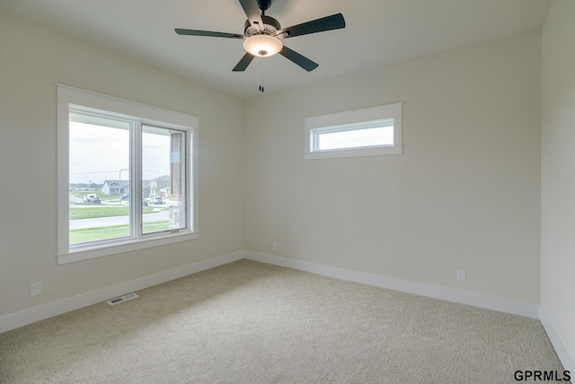 20806 Boulder St, Gretna, NE 68028 - carpeted empty room featuring visible vents, ceiling fan, and baseboards