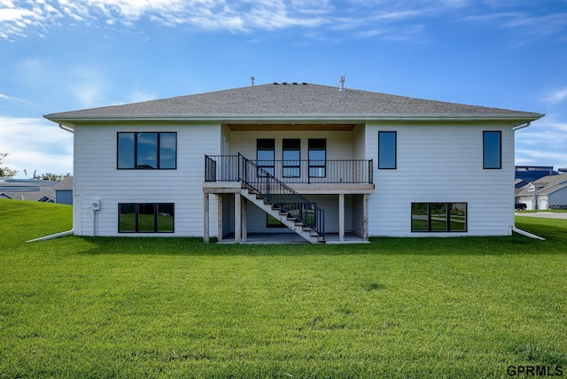 20806 Boulder St, Gretna, NE 68028 - back of property with a yard, stairs, a shingled roof, and a wooden deck